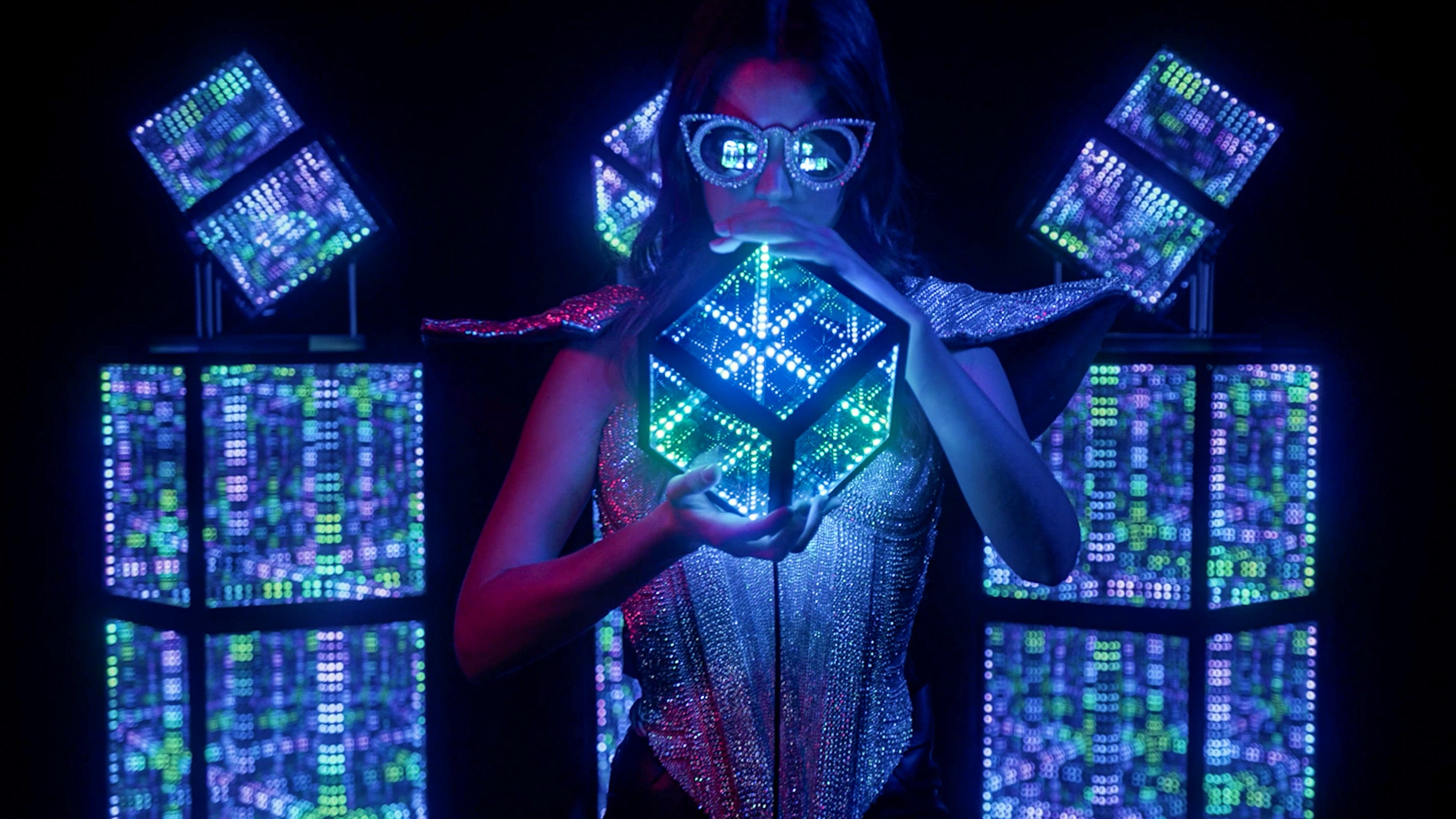 person holding hypercube 10 with hypercube 15 and hypercube 10 in background