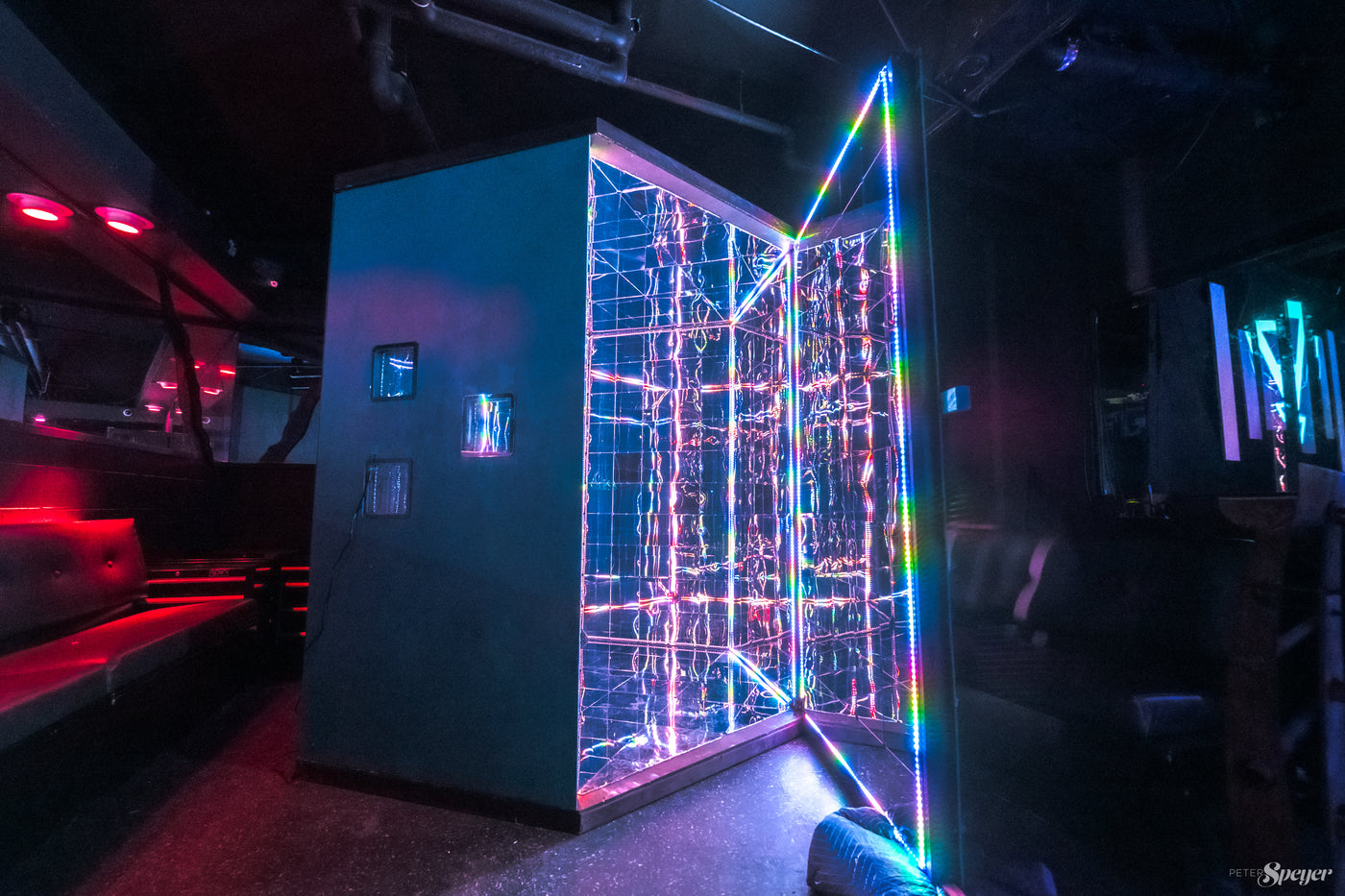 Long box full of strip lights that you can walk into for an immersive LED art experience at a club event