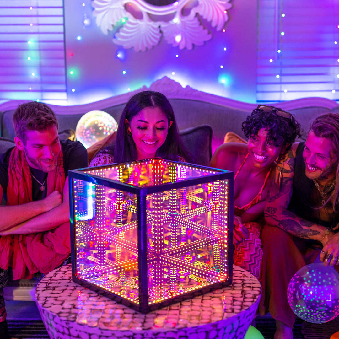 people surrounding hypercube15 in livingroom