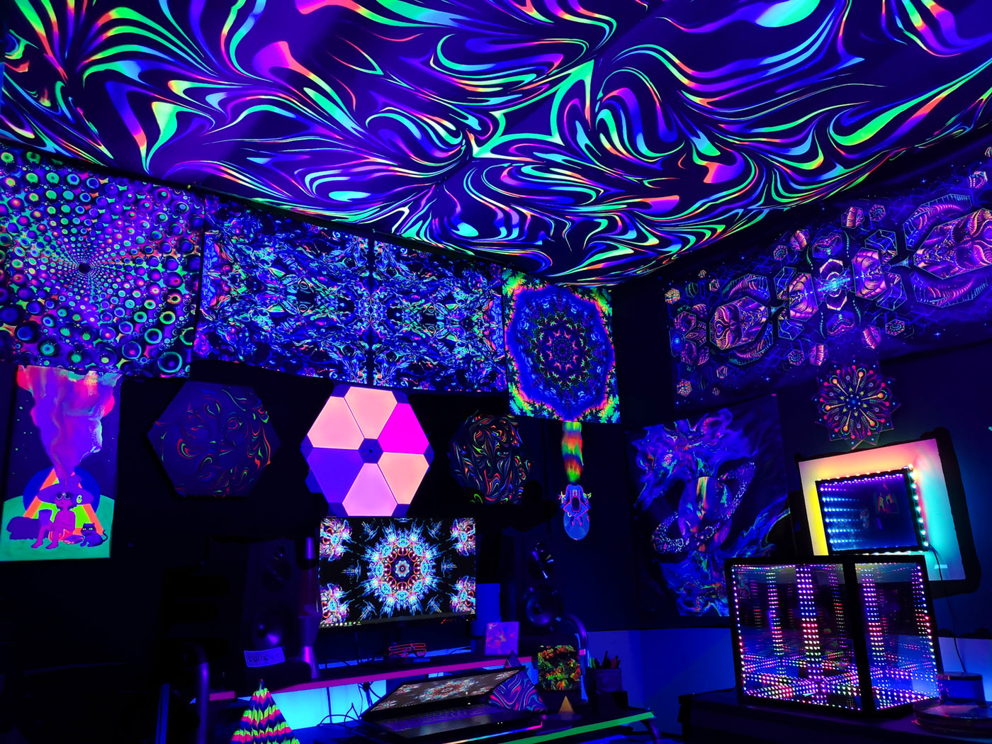 Office space decorated with trippy, psychedelic prints as well as a Hypercube with color changing lights - perfect environment for a meditative trip